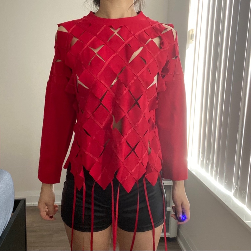 Red top with tassels